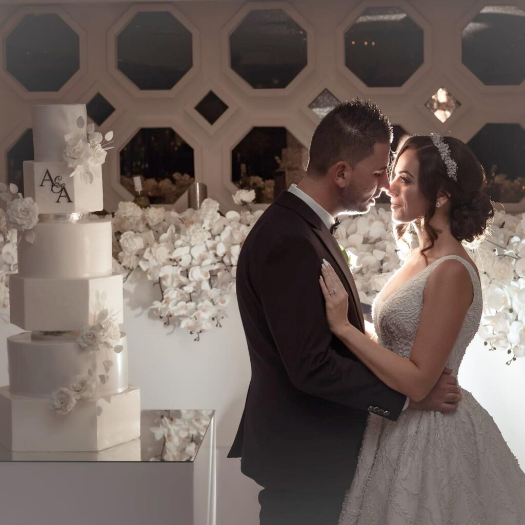 wedding cake and bride and groom 